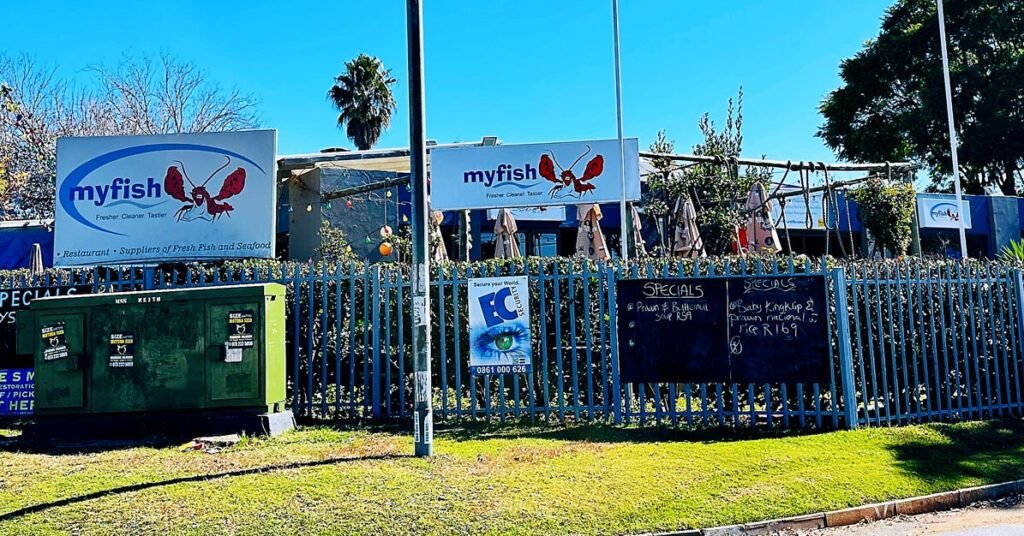Exterior entrance and signage of MyFish restaurant in Florida North.